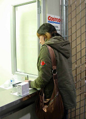 woman buying on a pharmacy